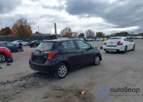 2015 Toyota Yaris Le z USA, uszkodzony, nr VIN VNKKTUD38FA048299
